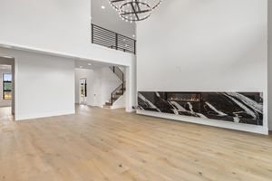 Living room by Home Plans NW
